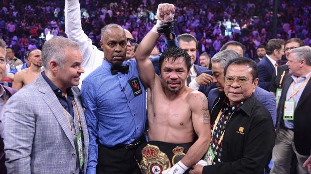 Pacquiao menang angka atas Thurman. (