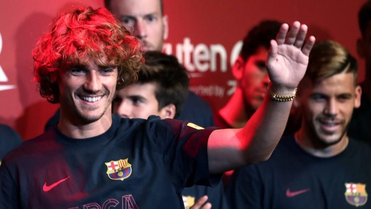 Antoine Griezmann dalam acara tur Barcelona di Jepang (Behrouz MEHRI / AFP)