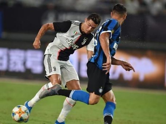 JUDI ONLINE Aksi Cristiano Ronaldo saat Juventus mengalahkan Inter Milan di International Champions Cup 2019. (Foto: Hector Retamal/AFP)