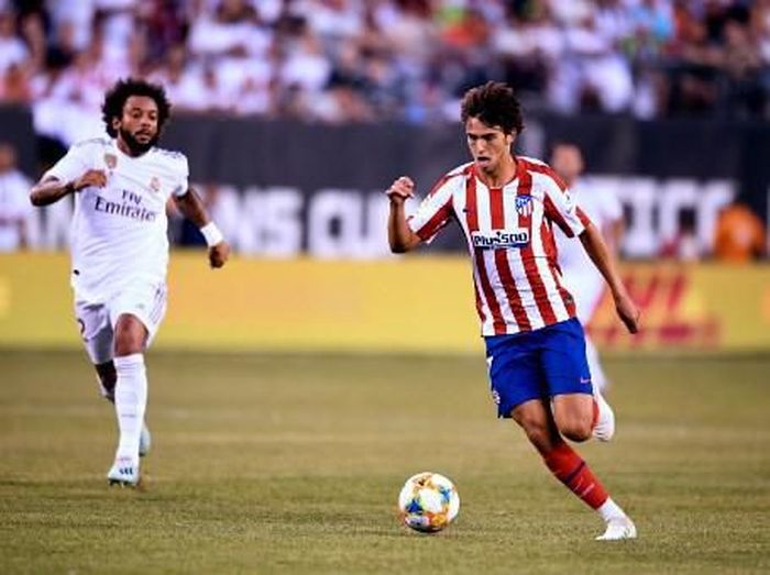 Aksi Joao Felix saat Atletico Madrid menggulung Real Madrid di International Champions Cup 2019.(Foto: Johannes Eisele/ AFP)