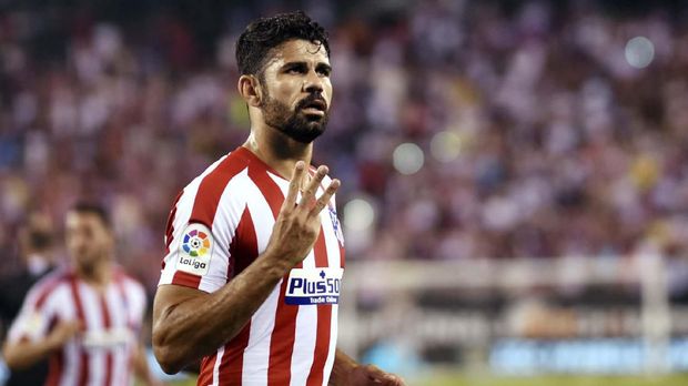 Atletico Madrid's Diego Costa celebrates after scoring his third goal during the 2019 International Champions Cup football match between Real Madrid and Atletico Madrid at the Metlife Stadium Arena in East Rutherford, New Jersey on July 26, 2019. (Photo by Johannes EISELE / AFP)