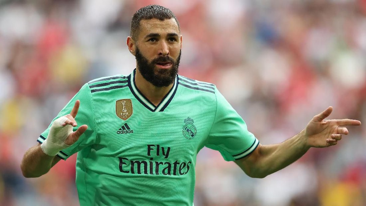Karim Benzema mencetak hat-trick saat Real Madrid menang 5-3 atas Fenerbahce (Foto: Christian Kaspar-Bartke/Getty Images for AUDI)