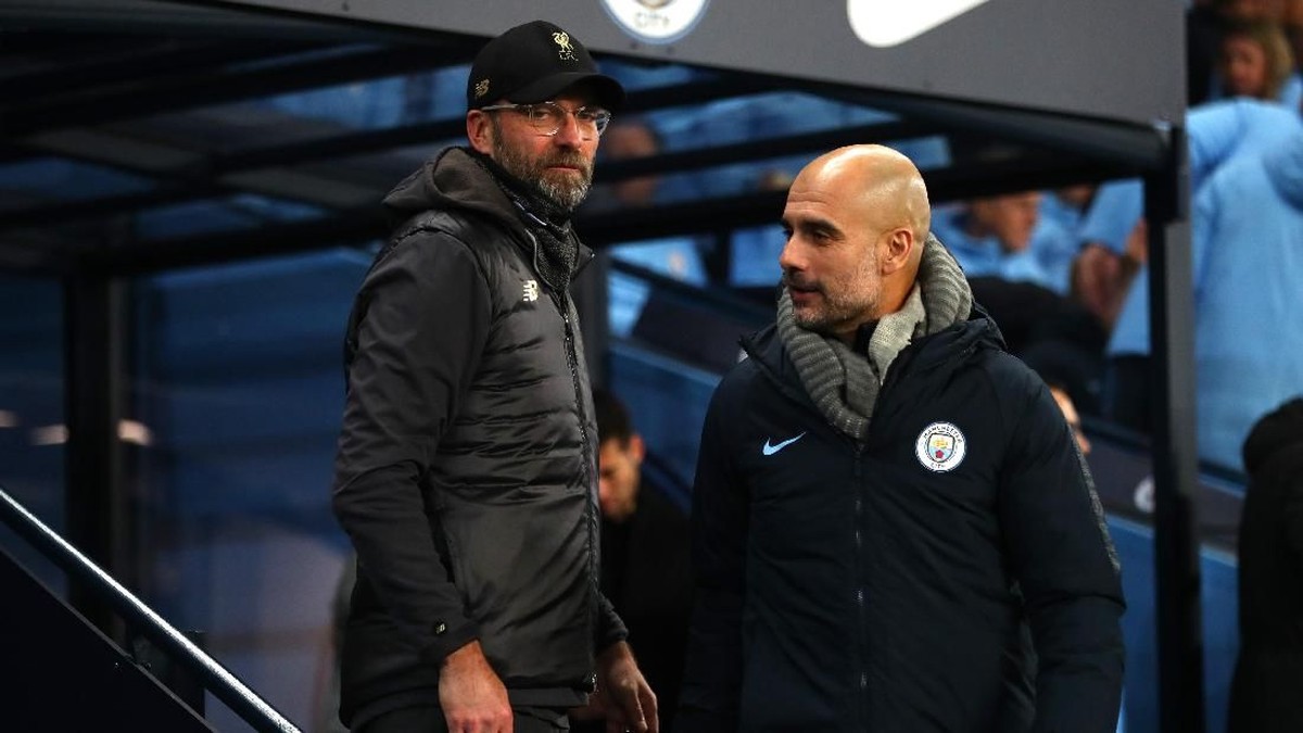 Pep Guardiola akui Juergen Klopp sangat tangguh. (Foto: Clive Brunskill / Getty Images)