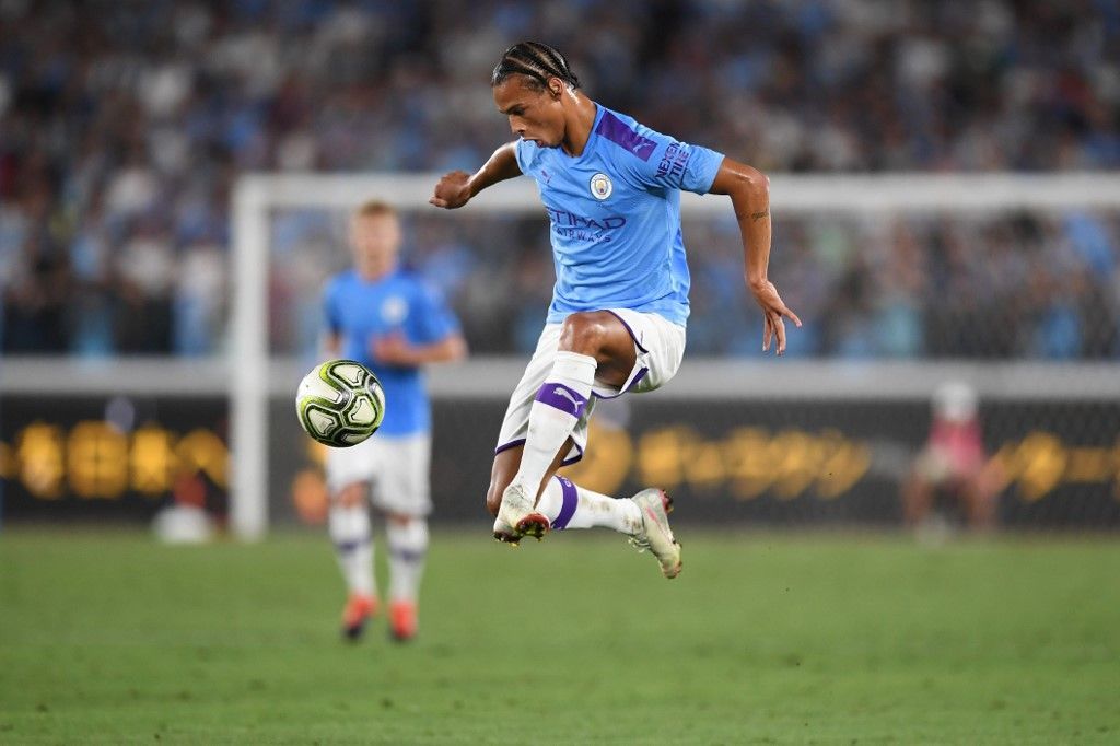 Manchester City's midfielder Leroy Sane controls the ball during a friendly football match between English Premier League club Manchester City and Japan League Yokohama F. Marinos at the Yokohama Stadium, in Yokohama on July 27, 2019. (Photo by CHARLY TRIBALLEAU / AFP)