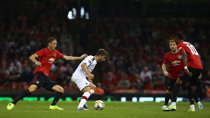 Man United mengalahkan AC Milan lewat adu penalti di ICC 2019. (Foto: Geoff Caddick / AFP) Man United mengalahkan AC Milan lewat adu penalti di ICC 2019. (Foto: Geoff Caddick / AFP)