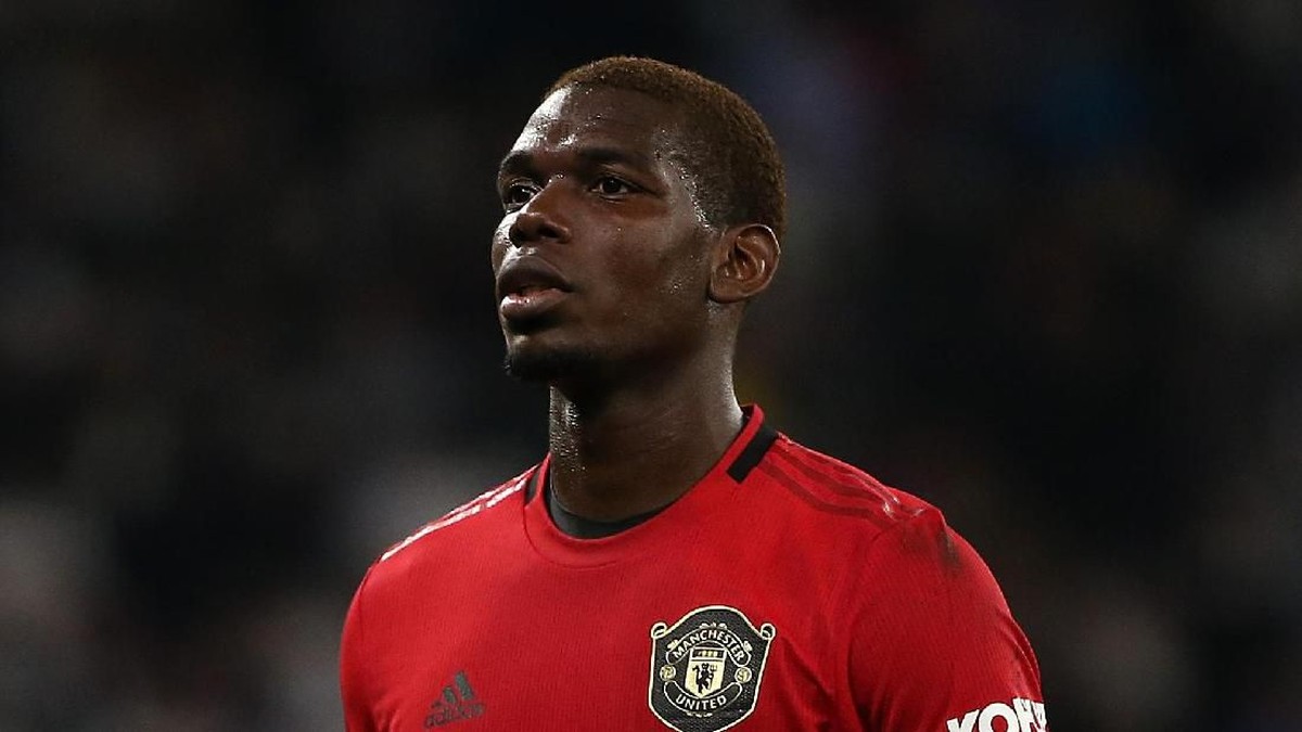 Paul Pogba sebenarnya diminati Real Madrid tapi Man United enggan menjual (Paul Kane/Getty Images)