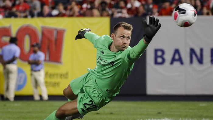 Simon Mignolet tak menyesal meninggalkan Liverpool saat berpeluang besar memenangi Liga Inggris di musim ini. (Foto: AP Photo/Frank Franklin II) Simon Mignolet tak menyesal meninggalkan Liverpool saat berpeluang besar memenangi Liga Inggris di musim ini. (Foto: AP Photo/Frank Franklin II)