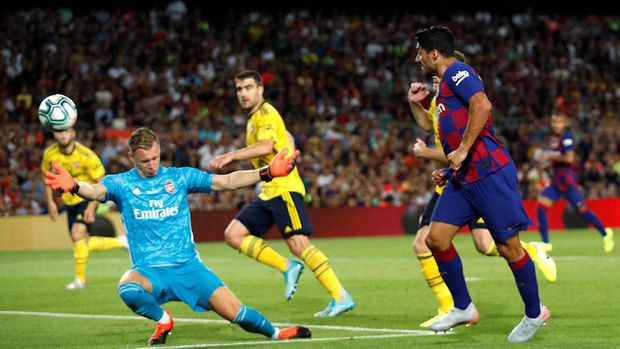 Luis Suarez (kanan) bakal jadi andalan bagi Barcelona melawan Valencia.