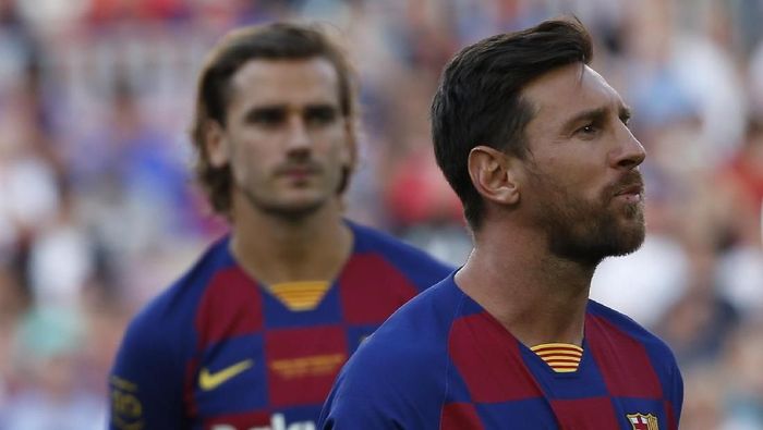 Antoine Griezmann dan Lionel Messi. (Foto: Joan Monfort/AP Photo) Antoine Griezmann dan Lionel Messi. (Foto: Joan Monfort/AP Photo)