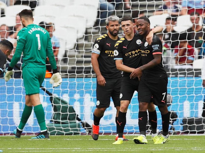 Soccer Football - Premier League - West Ham United v Manchester City - London Stadium, London, Britain - August 10, 2019  Manchester Citys Raheem Sterling celebrates scoring a hat-trick and Manchester Citys fifth goal   REUTERS/David Klein  EDITORIAL USE ONLY. No use with unauthorized audio, video, data, fixture lists, club/league logos or live services. Online in-match use limited to 75 images, no video emulation. No use in betting, games or single club/league/player publications.  Please contact your account representative for further details.