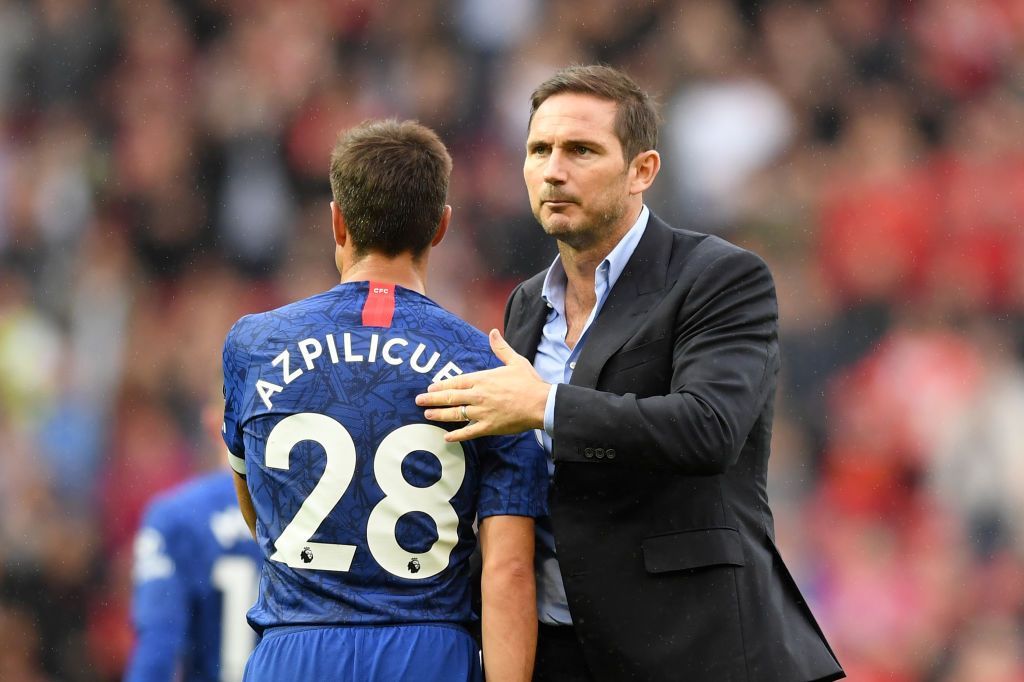 MANCHESTER, ENGLAND - AUGUST 11: Frank Lampard, Manager of Chelsea embraces Cesar Azpilicueta of Chelsea after the Premier League match between Manchester United and Chelsea FC at Old Trafford on August 11, 2019 in Manchester, United Kingdom. (Photo by Michael Regan/Getty Images)