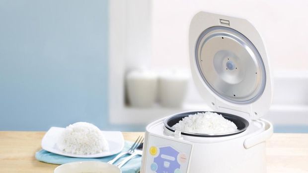 Ilustrasi masak nasi pakai rice cooker