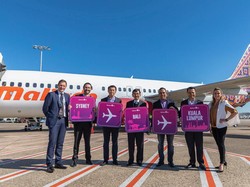 141 Penumpang Perdana Malindo Air Sydney-Denpasar Dapat Cupcake