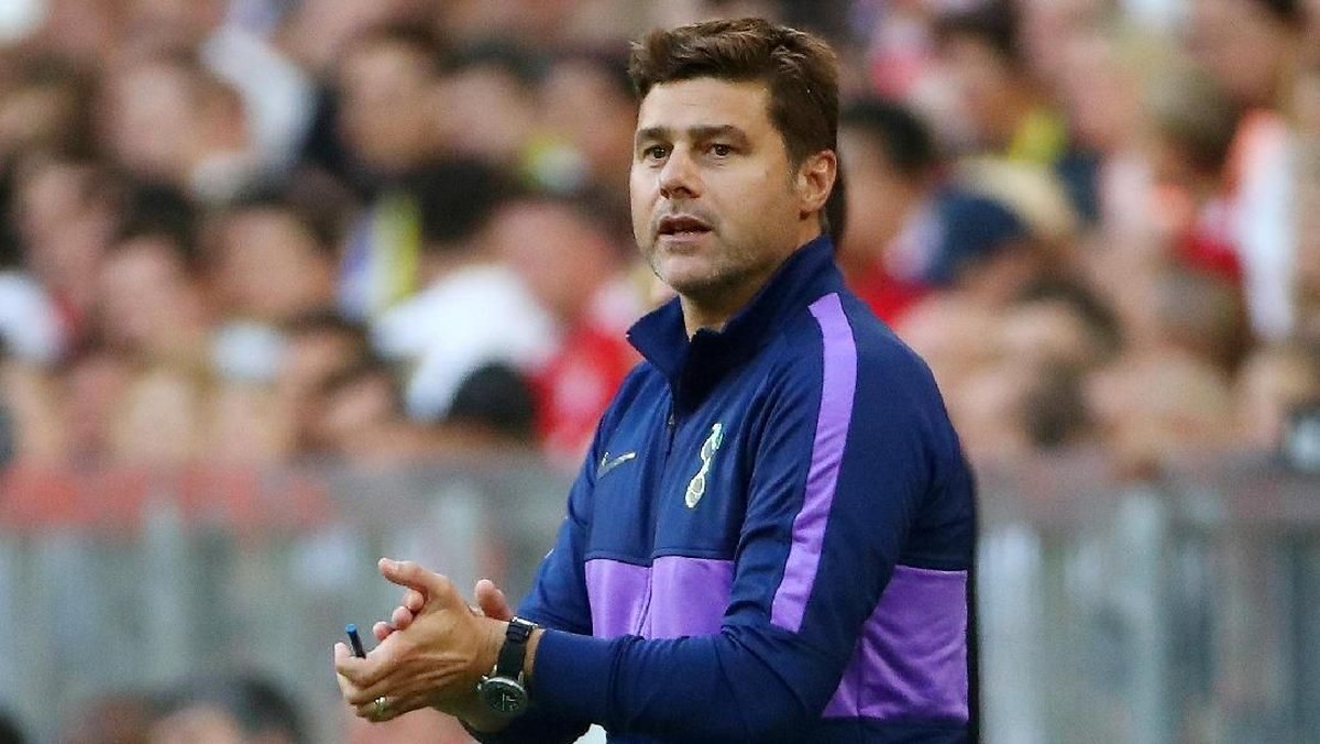 Mauricio Pochettino ingin kembali ke Newells Old Boys bersama Lionel Messi. (Foto: Michael Dalder/Reuters)