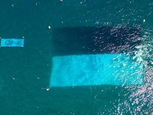 Persembahan WASI, Merah Putih Membentang di Dasar Teluk Manado Persembahan WASI, Merah Putih Membentang di Dasar Teluk Manado