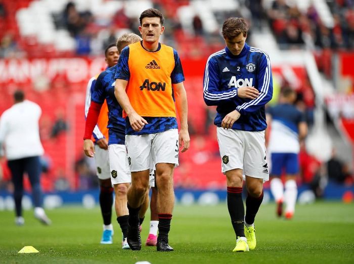 Pemain Manchester United, Harry Maguire dan Victor Lindelof. (Foto: Jason Cairnduff/Action Images via Reuters) Pemain Manchester United, Harry Maguire dan Victor Lindelof. (Foto: Jason Cairnduff/Action Images via Reuters)