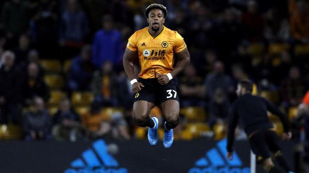 Wolverhampton Wanderers' Adama Traore warms up prior the second half of the English Premier League soccer match between Wolverhampton Wanderers and Manchester United at the Molineux Stadium in Wolverhampton, England, Monday, Aug. 19, 2019. (AP Photo/Rui Vieira)