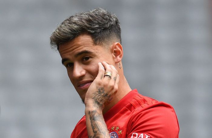 Philippe Coutinho Brazilian midfielder Philippe Coutinho (R), new recruit of German first division Bundesliga football club FC Bayern Munich, is pictured during his presentation in the stadium in Munich, southern Germany, on August 19, 2019. - Coutinho has joined Bayern Munich on a one-year loan worth 8.5 million euros ($9.5 million) with an option to buy, Spanish club Barcelona confirmed on August 19, 2019. (Photo by Christof STACHE / AFP)
