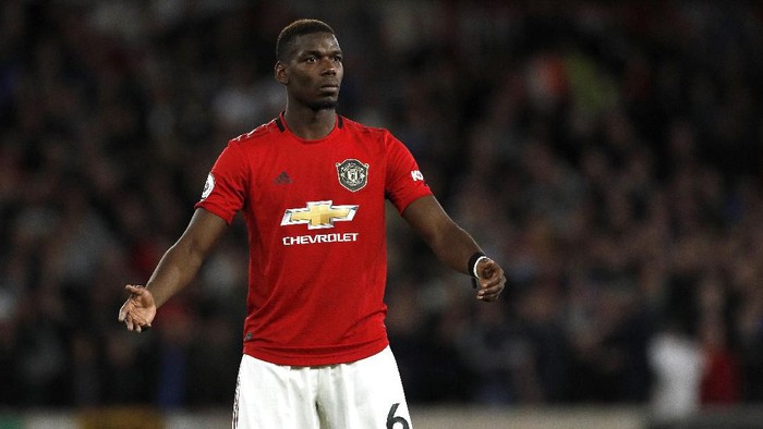 Manchester Uniteds Paul Pogba reacts during the English Premier League soccer match between Wolverhampton Wanderers and Manchester United at the Molineux Stadium in Wolverhampton, England, Monday, Aug. 19, 2019. (AP Photo/Rui Vieira)