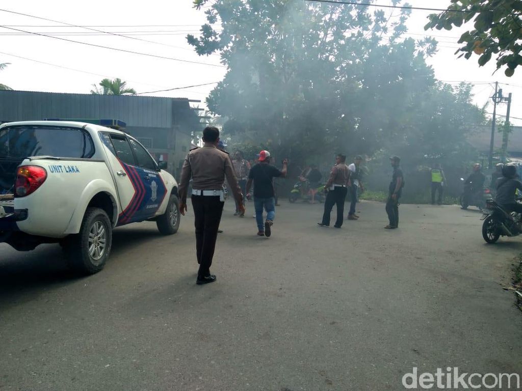 Aparat Kendalikan Kondisi Timika Papua Usai Ricuh Dekat Kantor DPRD Aparat Kendalikan Kondisi Timika Papua Usai Ricuh Dekat Kantor DPRD