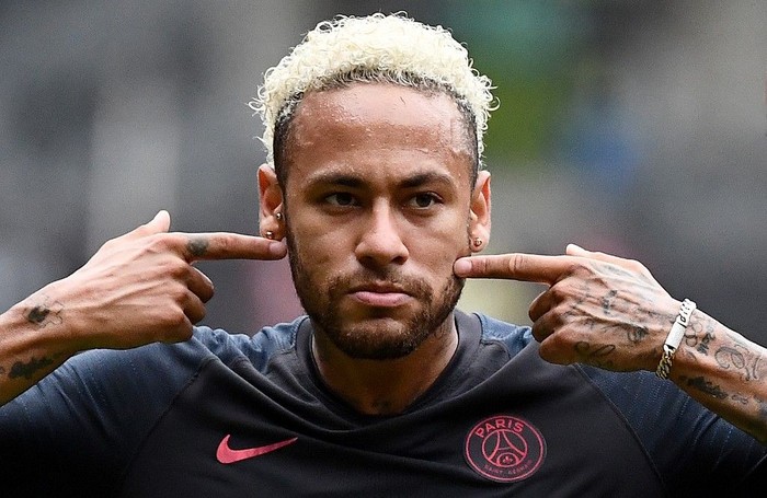 Paris Saint-Germains Brazilian forward Neymar reacts at the end of the French Trophy of Champions football match between Paris Saint-Germain (PSG) and Rennes (SRFC) at the Shenzhen Universiade stadium on August 3, 2019. - Representatives of FC Barcelona went on August 13, 2019 to France to discuss with those of Paris of a possible return to Barça of the Brazilian star Neymar without the file changing significantly. (Photo by FRANCK FIFE / AFP)