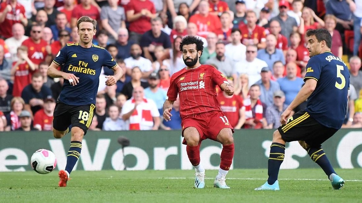 Striker Liverpool Mohamed Salah (tengah) di laga melawan Arsenal. (Foto: Laurence Griffiths/Getty Images)