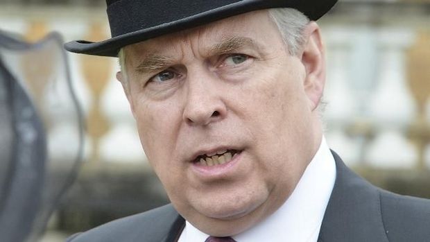 (FILES) In this file photo taken on May 10, 2016 Britain's Prince Andrew, Duke of York (C) speaks to guests in the garden of Buckingham Palace in London as up to 8,000 guests attend the first royal garden party of the year on May 10, 2016. - Britain's Prince Andrew has said on August 18, 2019 he was 