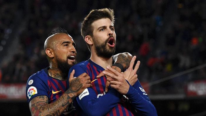 Gerard Pique dan Arturo Vidal raup hadiah besar dari turnamen judi (David Ramos/Getty Images)