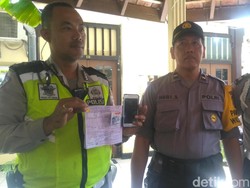 Seorang Oknum Ojek Online di Surabaya Ngaku Wartawan Saat Ditilang