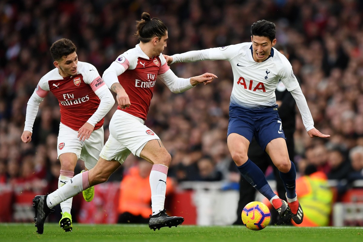 Laga Arsenal vs Tottenham Hotspur akan meramaikan Liga Inggris akhir pekan ini (Foto: Shaun Botterill/Getty Images)