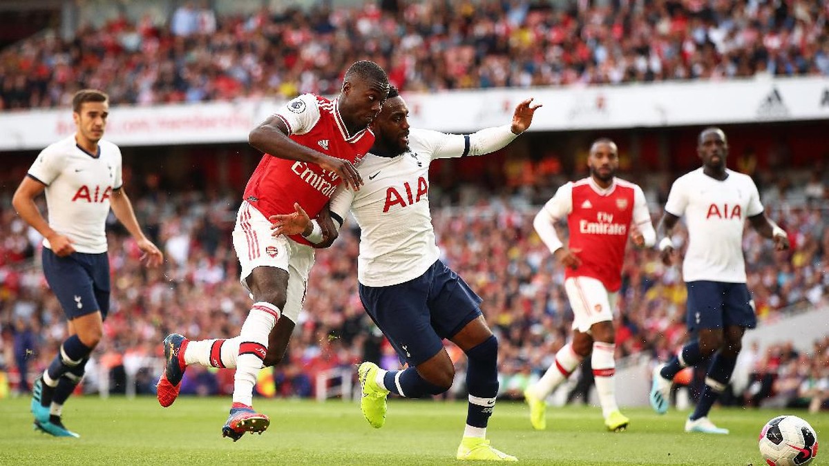 Arsenal berimbang 2-2 usai tertinggal dua gol dari Tottenham. (Foto: Julian Finney/Getty Images)