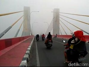 Palembang hingga OKI Diselimuti Kabut Asap Pagi Ini