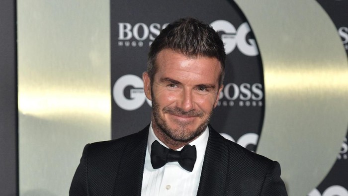 LONDON, ENGLAND - SEPTEMBER 03: David Beckham, Victoria Beckham and their son Brooklyn Beckham attend the GQ Men Of The Year Awards 2019 at Tate Modern on September 03, 2019 in London, England. (Photo by Jeff Spicer/Getty Images)