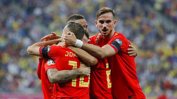Spains Paco Alcacer celebrates with team mates after scoring his sides second goal during the Euro 2020 group F qualifying soccer match between Romania and Spain, at the National Arena stadium in Bucharest, Romania, Thursday, Sept. 5, 2019. (AP Photo/Vadim Ghirda)