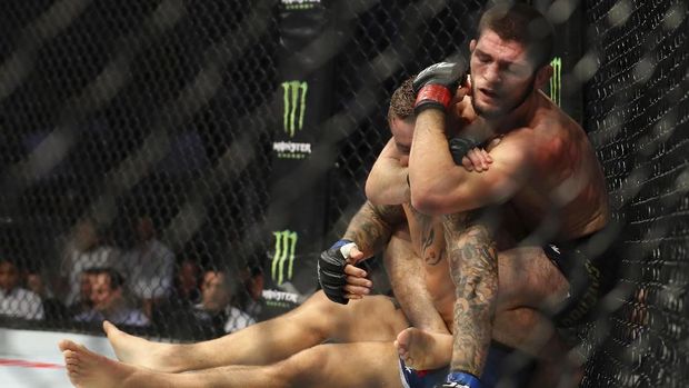 Dustin Poirier akhirnya menyerah di ronde ketiga.