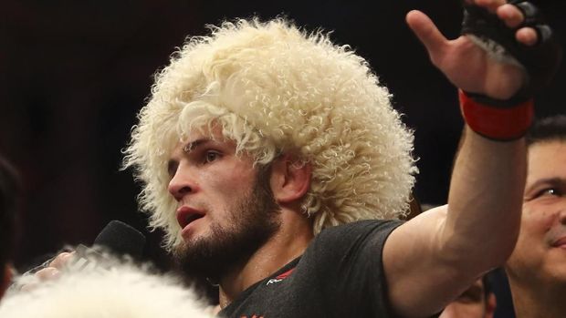 Russian UFC fighter Khabib Nurmagomedov, speaks after wining against UFC fighter Dustin Poirier, of Lafayette, La., during Lightweight title mixed martial arts bout at UFC 242, in Yas Mall in Abu Dhabi, United Arab Emirates, Saturday , Sept.7 2019. (AP Photo/ Mahmoud Khaled)