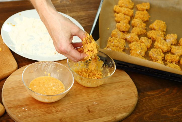 Making oven baked corn flake crumbs chicken nuggets. Series.