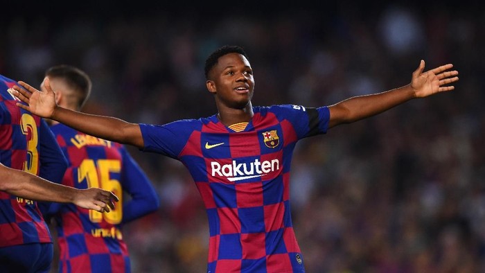 BARCELONA, SPAIN - SEPTEMBER 14:   Anssumane Fati of Barcelona celebrates after scoring his teams first goal during the Liga match between FC Barcelona and Valencia CF at Camp Nou on September 14, 2019 in Barcelona, Spain. (Photo by Alex Caparros/Getty Images)
