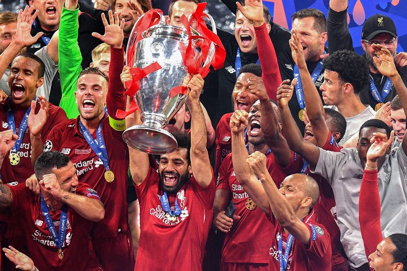 MADRID, SPAIN - JUNE 01: Mohamed Salah of Liverpool celebrates with the trophy at the end of the UEFA Champions League Final between Tottenham Hotspur and Liverpool at Estadio Wanda Metropolitano on June 01, 2019 in Madrid, Spain. (Photo by David Ramos/Getty Images)