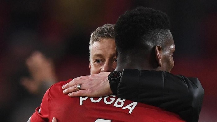 MANCHESTER, ENGLAND - DECEMBER 30:  Ole Gunnar Solskjaer, Interim Manager of Manchester United celebrates victory with Paul Pogba after the Premier League match between Manchester United and AFC Bournemouth at Old Trafford on December 30, 2018 in Manchester, United Kingdom.  (Photo by Michael Regan/Getty Images)