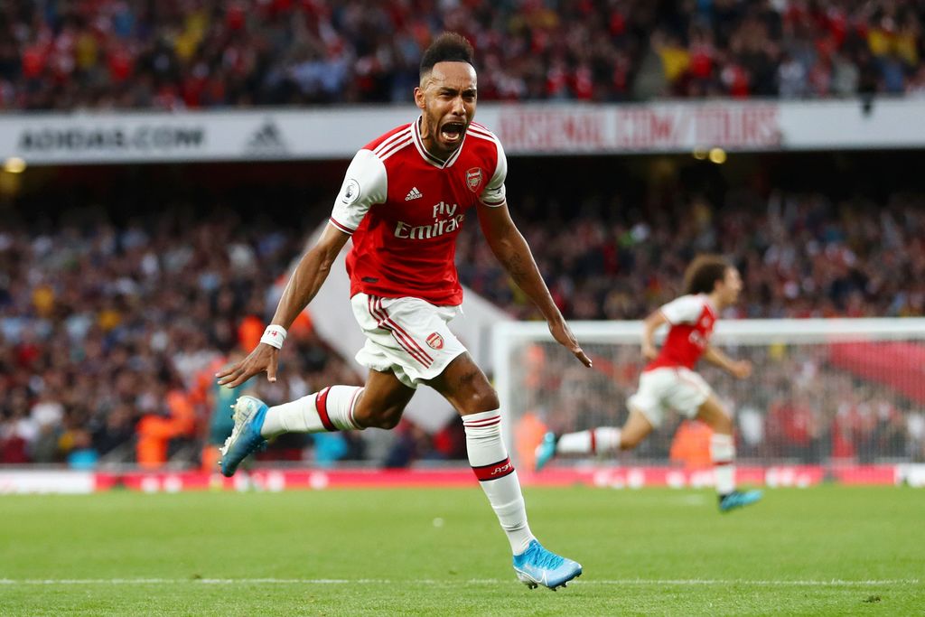 LONDON, ENGLAND - SEPTEMBER 22: Pierre-Emerick Aubameyang of Arsenal celebrates scoring his team's third goal during the Premier League match between Arsenal FC and Aston Villa at Emirates Stadium on September 22, 2019 in London, United Kingdom. (Photo by Michael Steele/Getty Images)