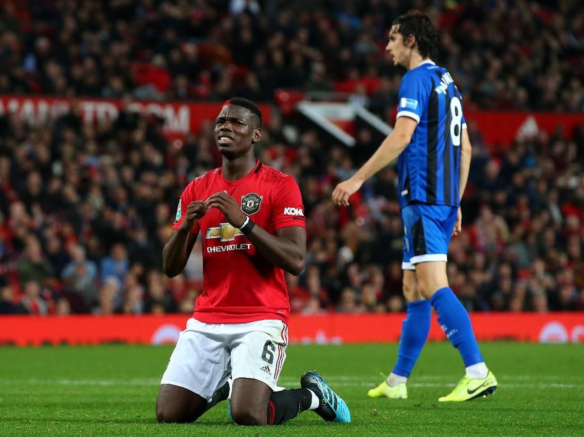 Manchester United susah payah mengalahkan Rochdale yang datang dari Divisi 3 (Alex Livesey/Getty Images)