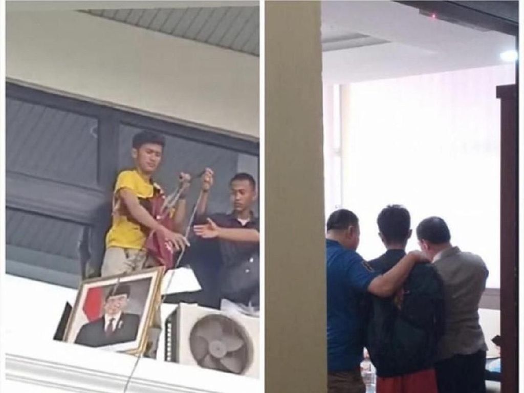 Polisi Amankan Mahasiswa yang Turunkan Pigura Foto Jokowi Polisi Amankan Mahasiswa yang Turunkan Pigura Foto Jokowi