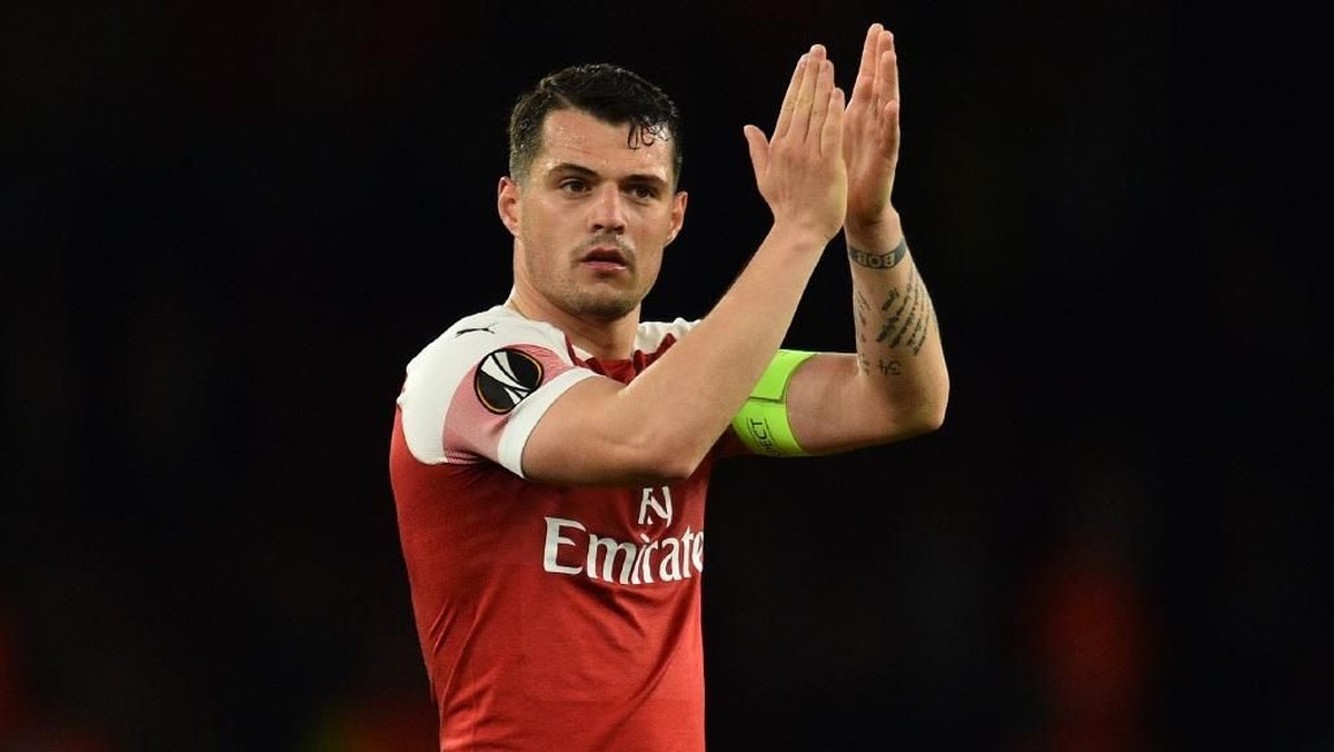 Granit Xhaka kapten baru Arsenal (Foto: Glyn KIRK / AFP)