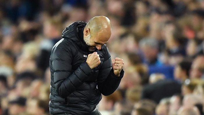 Pep Guardiola menciptakan rekor 100 kemenangan tercepat di Premier League yang dicapai manajer. Foto: Michael Regan/Getty Images