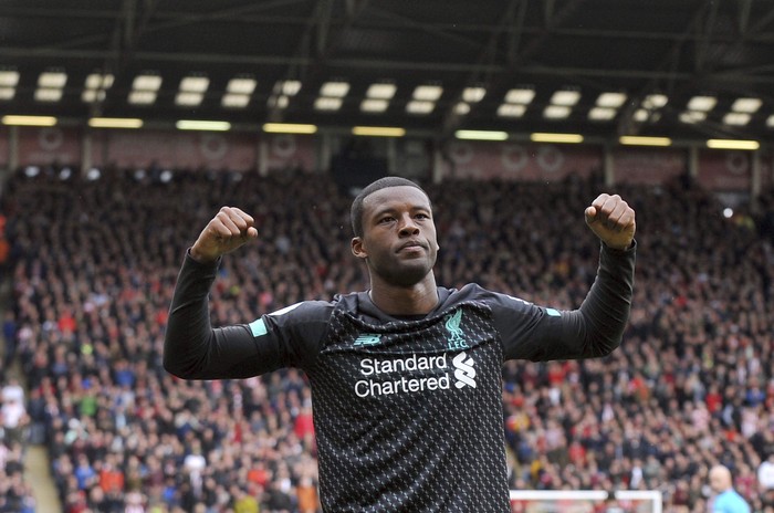 Liverpools Georginio Wijnaldum celebrates after scoring his sides opening goal during the English Premier League soccer match between Sheffield United and Liverpool at Bramall Lane in Sheffield, England, Saturday, Sept. 28, 2019. (AP Photo/Rui Vieira)