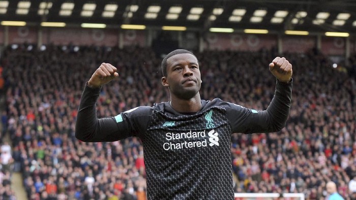 Liverpools Georginio Wijnaldum celebrates after scoring his sides opening goal during the English Premier League soccer match between Sheffield United and Liverpool at Bramall Lane in Sheffield, England, Saturday, Sept. 28, 2019. (AP Photo/Rui Vieira)