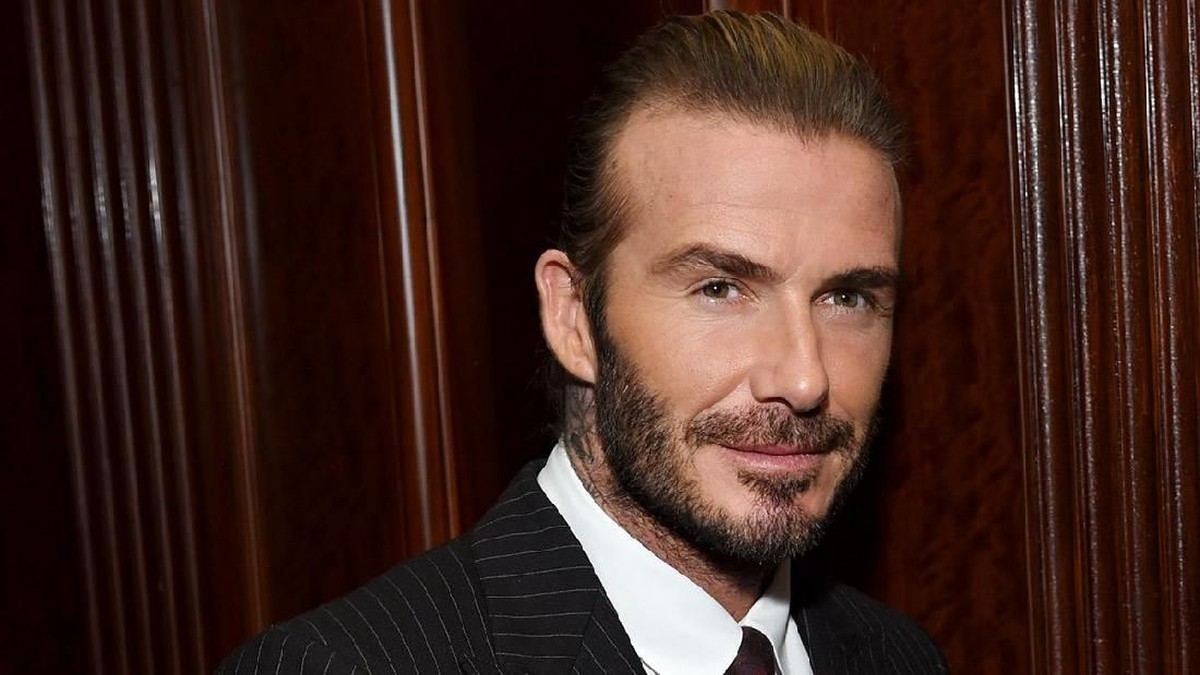 David Beckham mengunjungi salah seorang penggemar Liverpool (Foto: Istimewa)