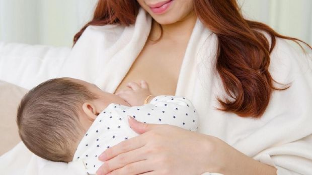 Ilustrasi menyusui bayi