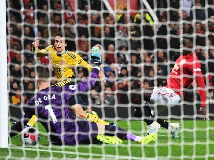 David De Gea melakukan penyelamatan saat Manchester United menjamu Arsenal di Liga Inggris, ( Foto: Michael Regan/Getty Images) David De Gea melakukan penyelamatan saat Manchester United menjamu Arsenal di Liga Inggris, ( Foto: Michael Regan/Getty Images)